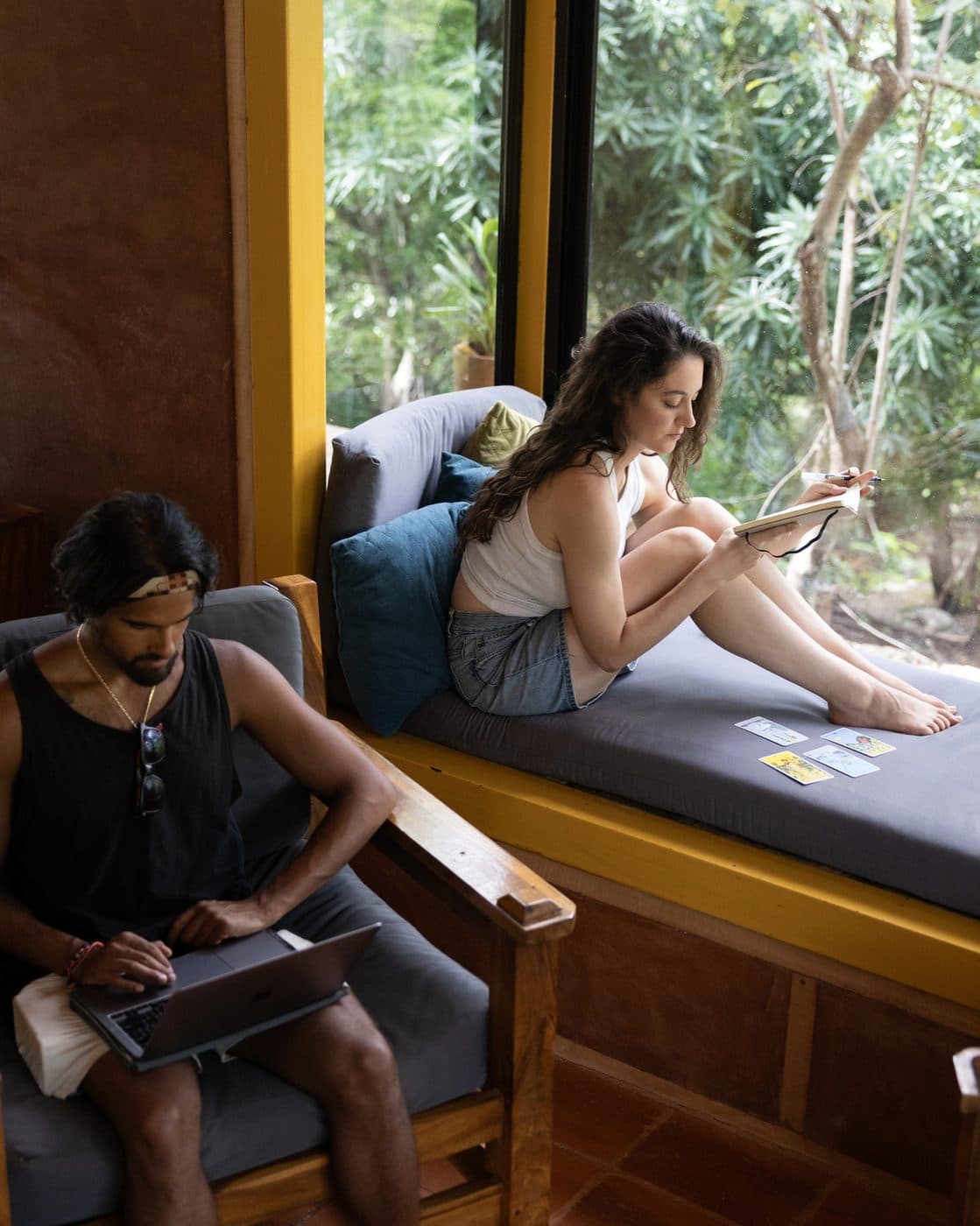 A casita window looking out into the forest canopy